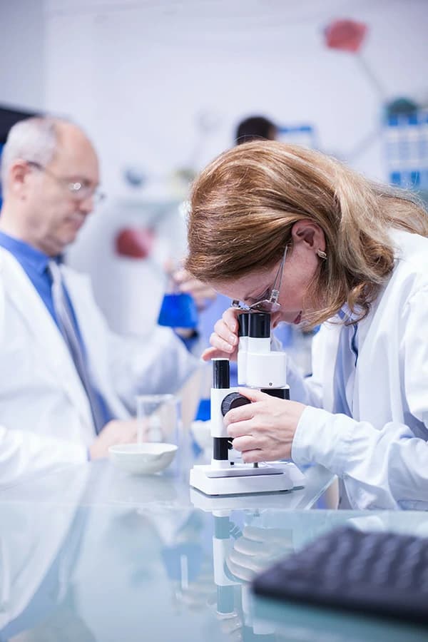 Cancer researchers working in a laboratory